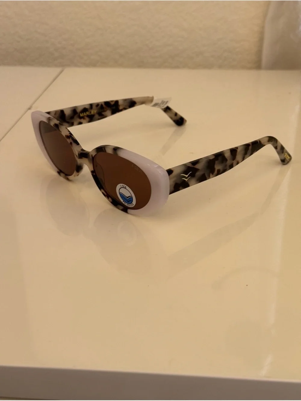 Anthropologie Tortoiseshell and White Oval Sunglasses - Brown Lenses